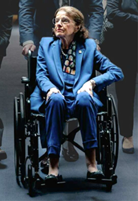 Diane Feinstein in a wheel chair on Capitol Hill