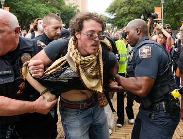 Police arrest protestors - Abbottt clls for expulsion
