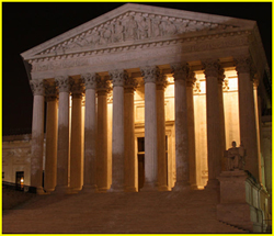 supreme court  building lit up at night